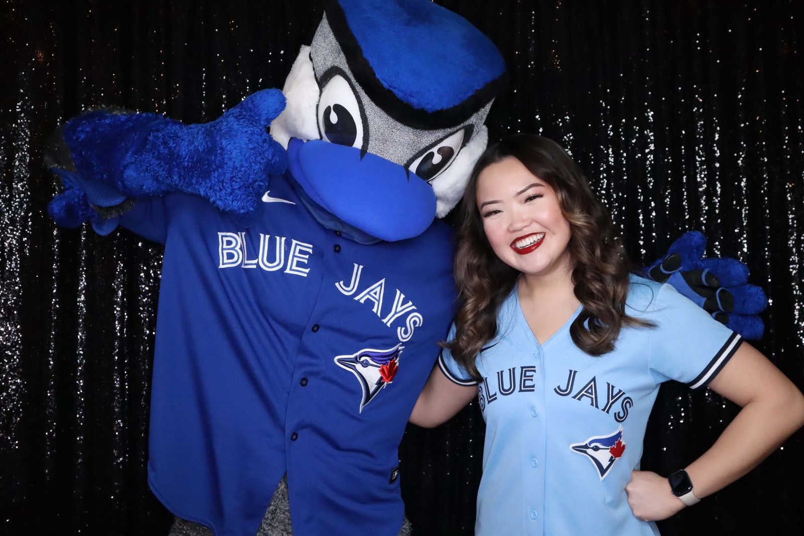 Toronto Blue Jays mascot Ace posing with a fan in a Peinc Studio photo booth
